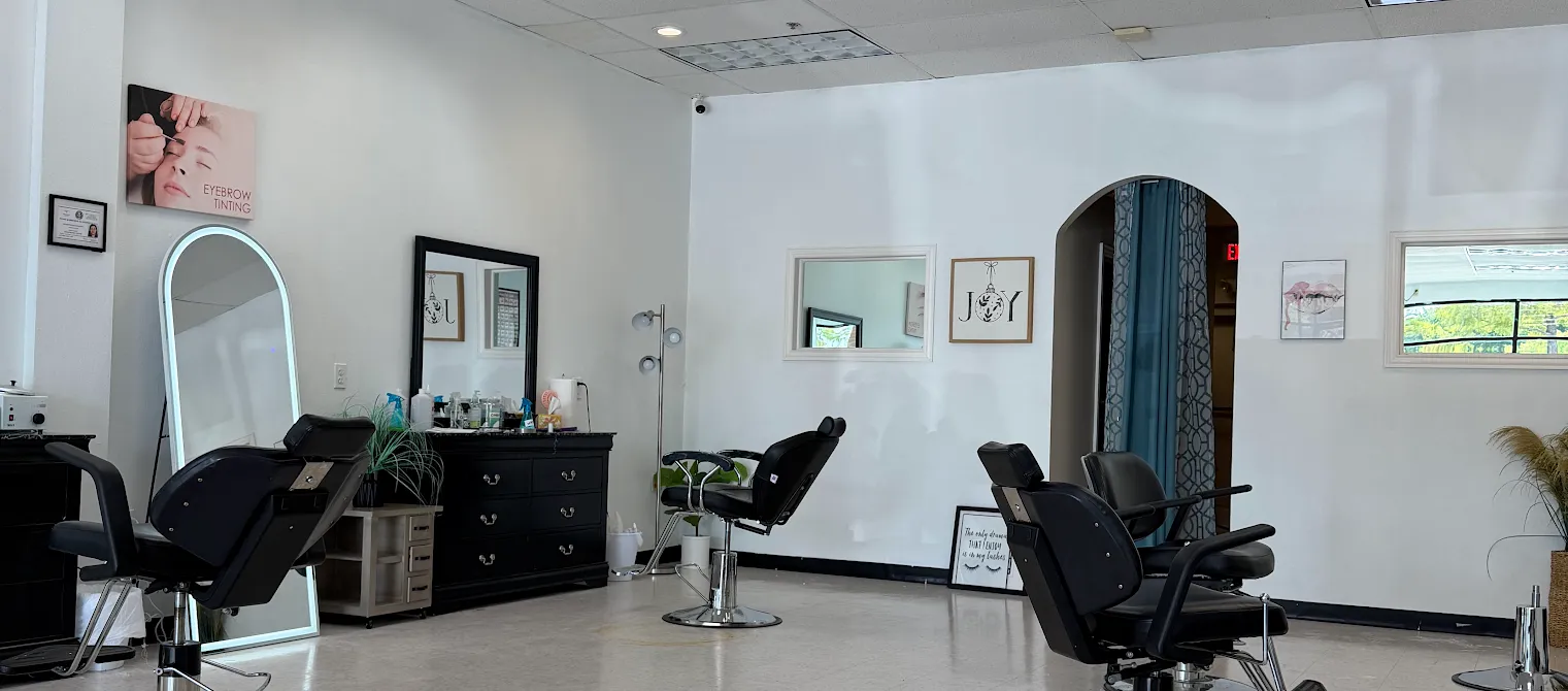 Inside Hollywood Beauty Bar's salon in Garland, TX — styling stations and mirrors
